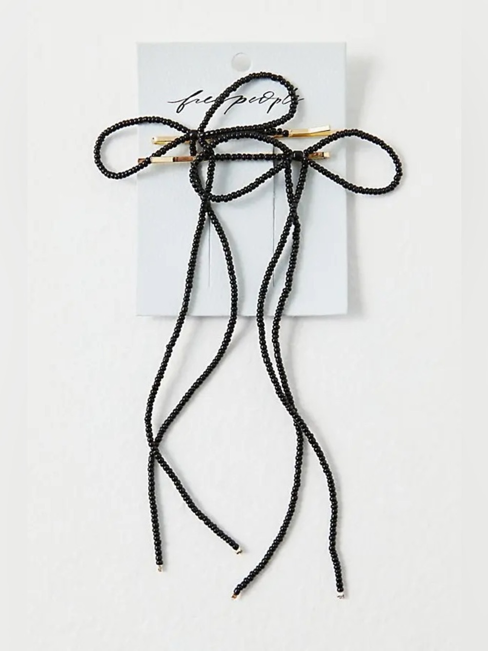 Free People beaded bow pin